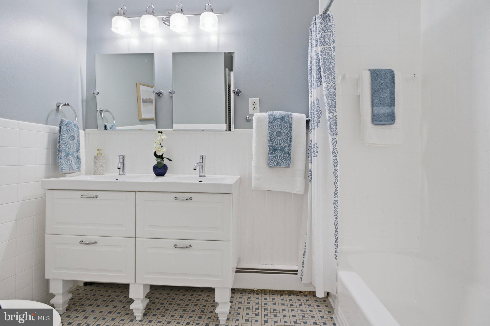 3104 North Providence Road Media, PA 19063 - Photo 23 of 47 Modern elegance in a serene bathroom.