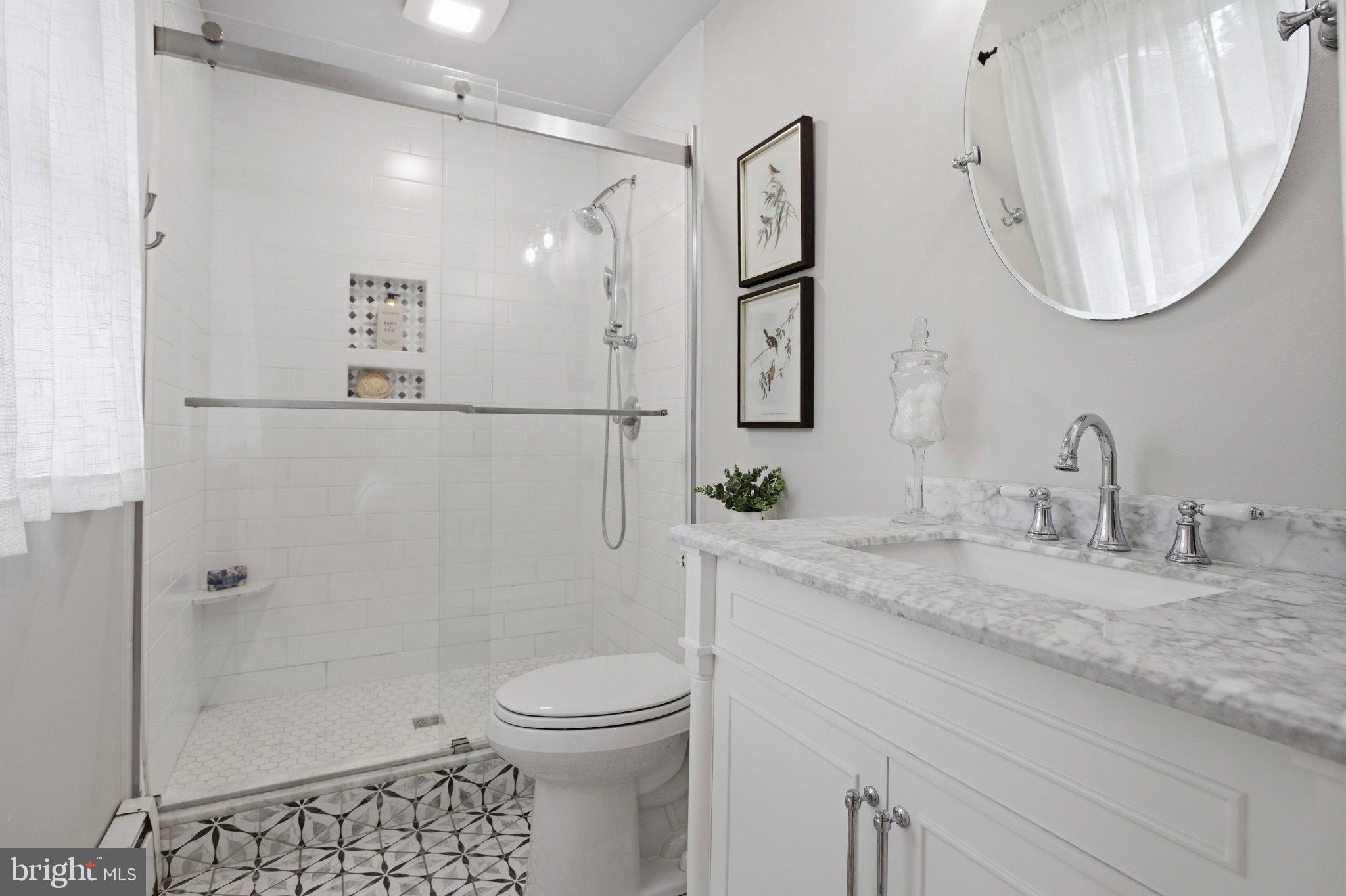 3104 North Providence Road Media, PA 19063 - Photo 28 of 47 Modern elegance in a serene bathroom.
