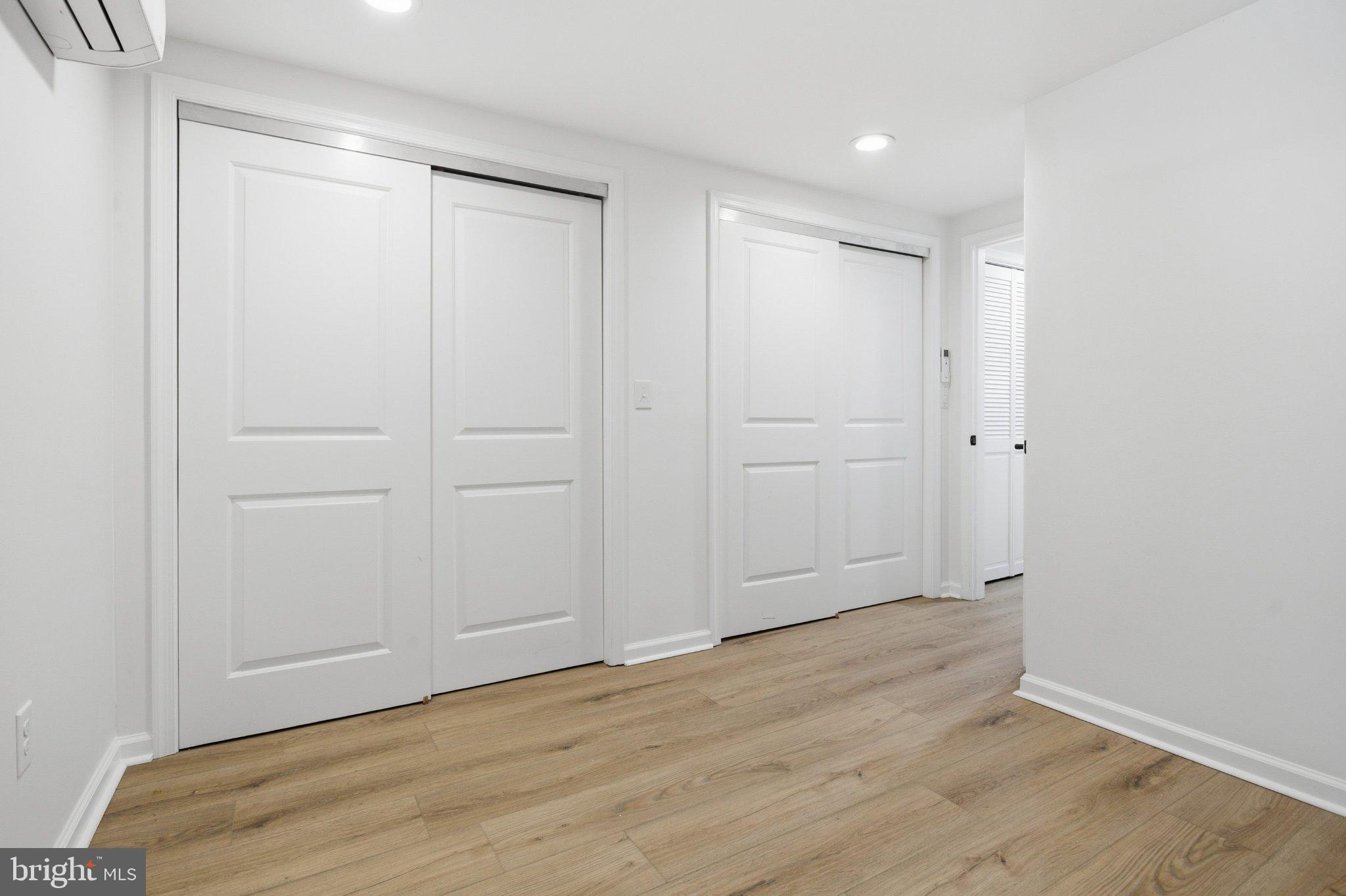 3104 North Providence Road Media, PA 19063 - Photo 31 of 47 Bright and airy hallway with sleek doors.