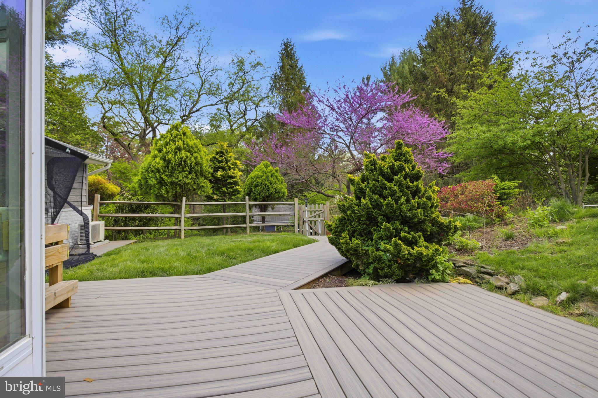 3104 North Providence Road Media, PA 19063 - Photo 45 of 47 Serene garden path with vibrant blooms.