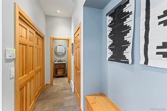 a view of a hallway view with staircase