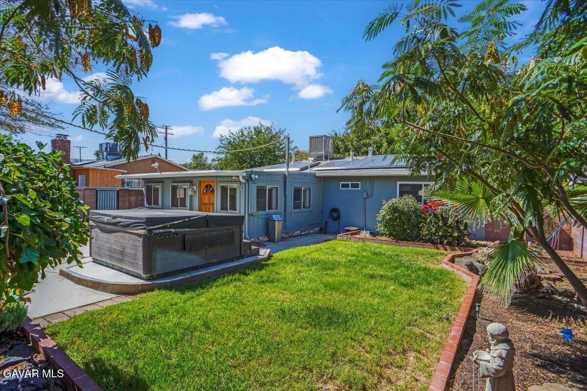 42652 55th Street West Lancaster, CA 93536 - Photo 20 of 28 a front view of house with yard and green space