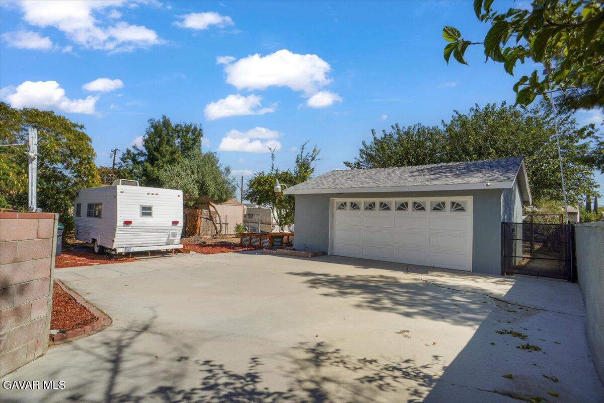 42652 55th Street West Lancaster, CA 93536 - Photo 23 of 28 a view of a house with a outdoor space