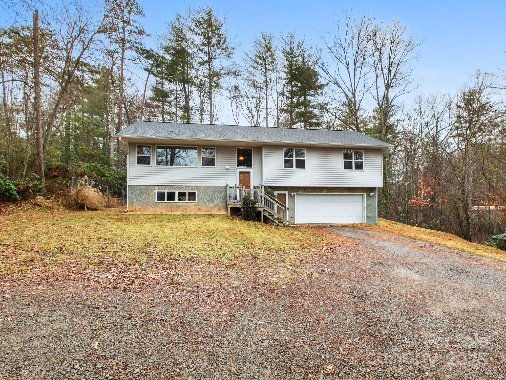 15 Gunflint Trail Fletcher, NC 28732 - Photo 3 of 25 a house view with a outdoor space