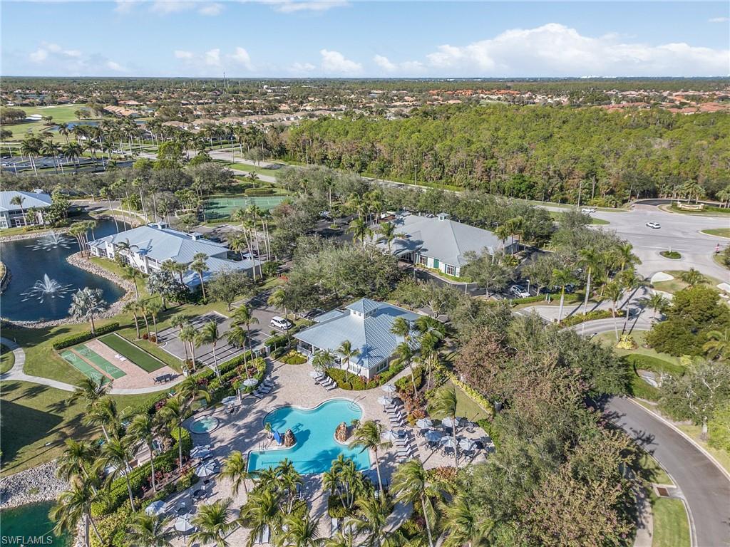 7870 Mahogany Run Lane, Unit 1724 Naples, FL 34113 - Photo 21 of 21 an aerial view of residential houses with outdoor space and trees