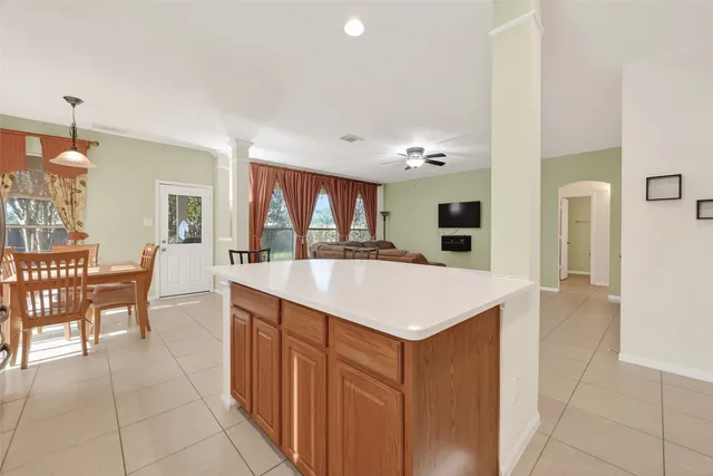 a kitchen with a stove and a microwave