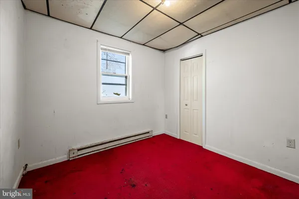 a view of a room with a hallway