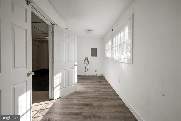 a view of a refrigerator in a room