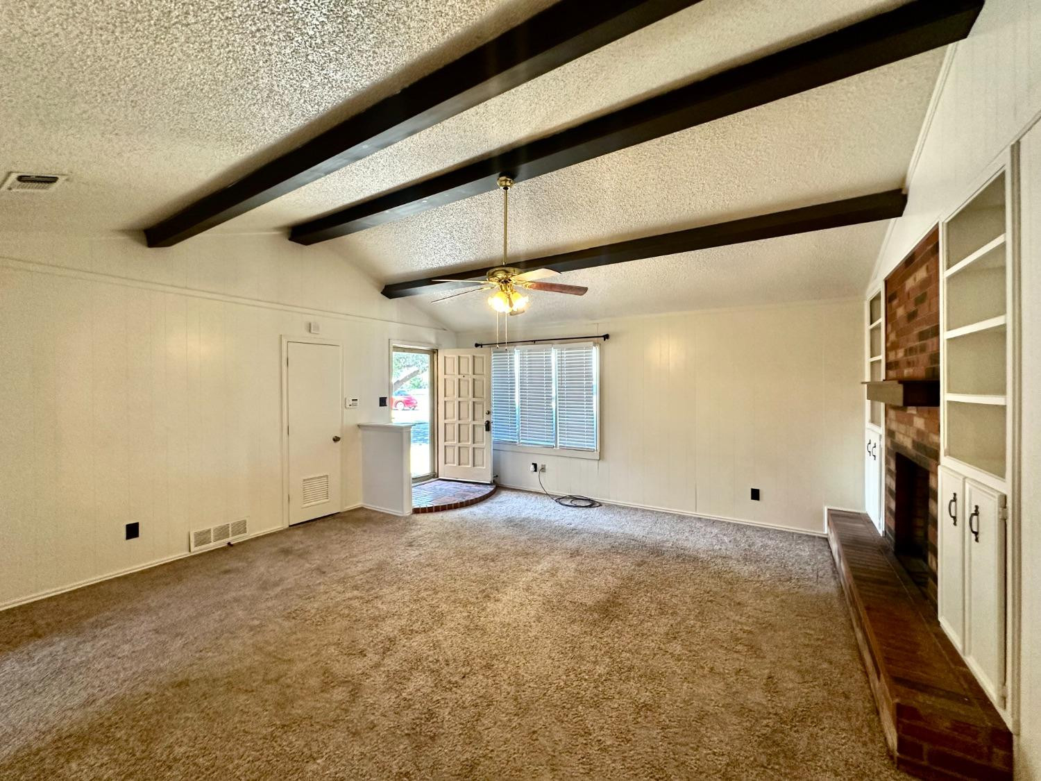 7805 Memphis Avenue, Unit B Lubbock, TX 79423 - Photo 3 of 13 a view of an empty room