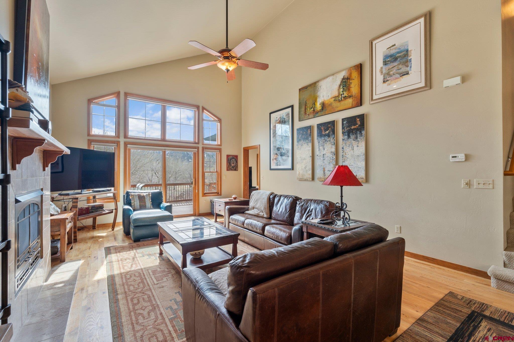 784 Animas View Drive Durango, CO 81301 - Photo 17 of 35 a living room with furniture and a chandelier