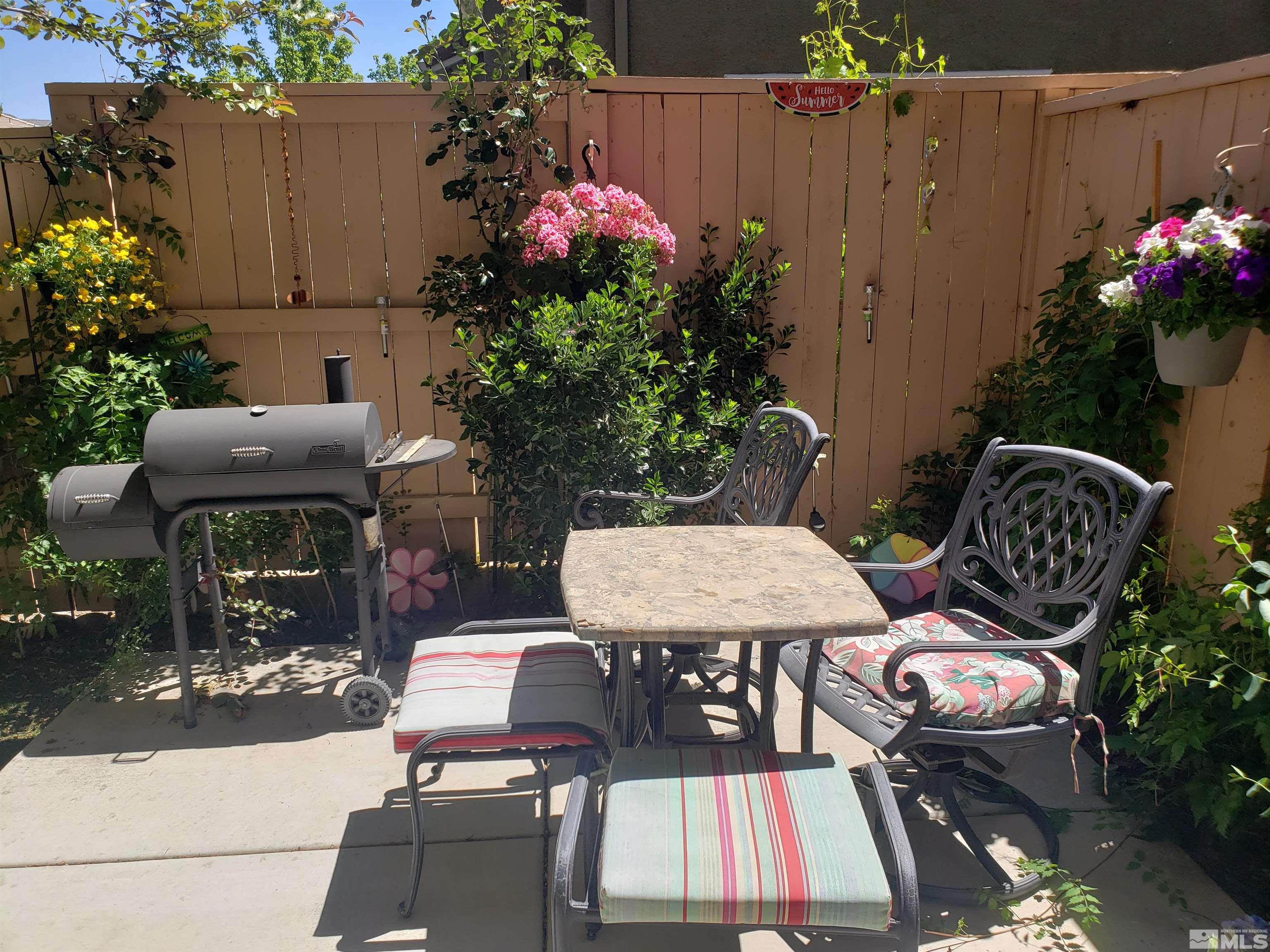 1896 Wind Ranch Road, Unit A Reno, NV 89521 - Photo 12 of 36 a view of a outdoor seating area