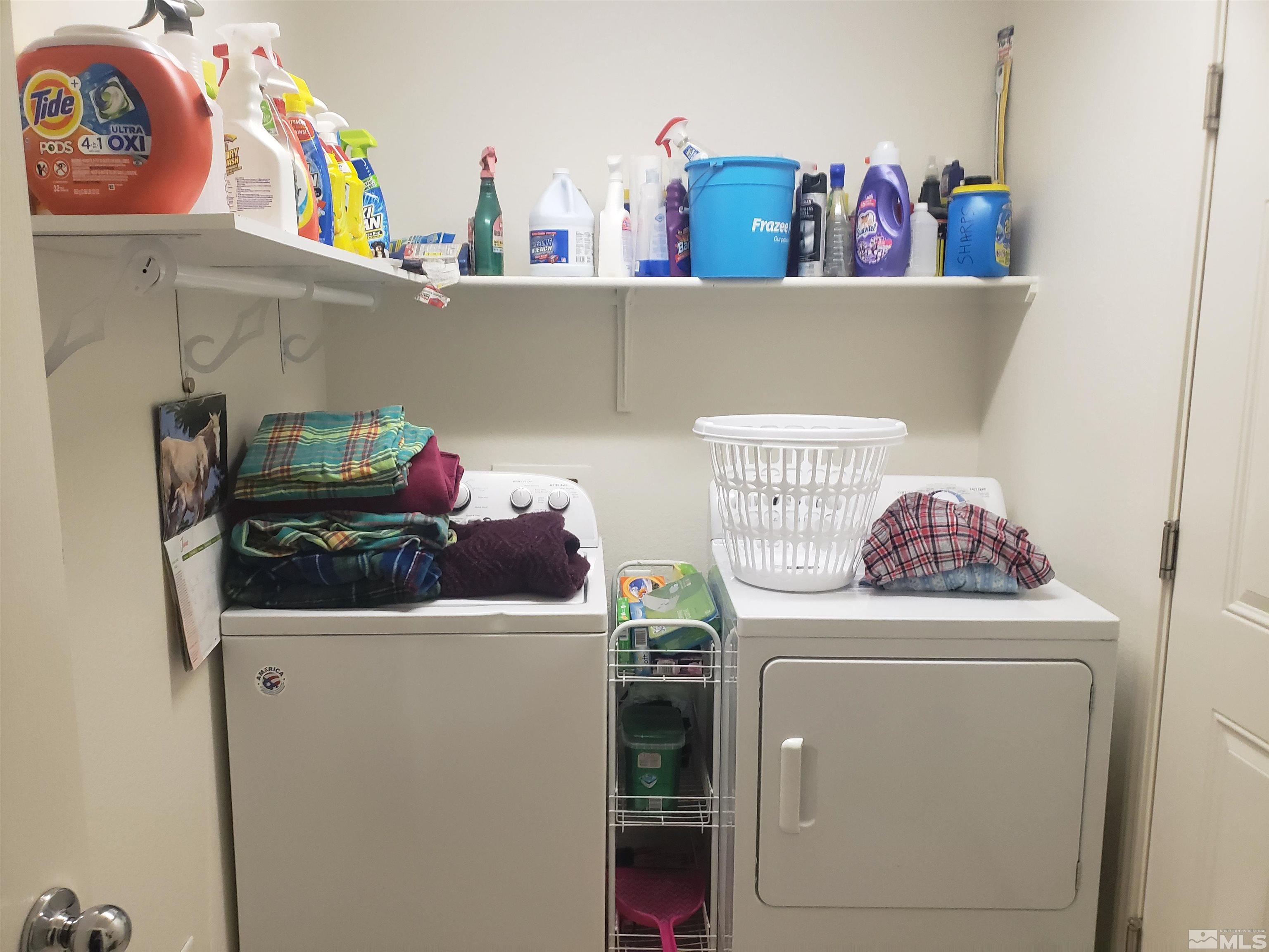 1896 Wind Ranch Road, Unit A Reno, NV 89521 - Photo 34 of 36 a utility room with dryer and washer