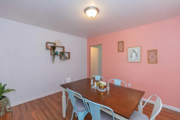 a view of a workspace with furniture