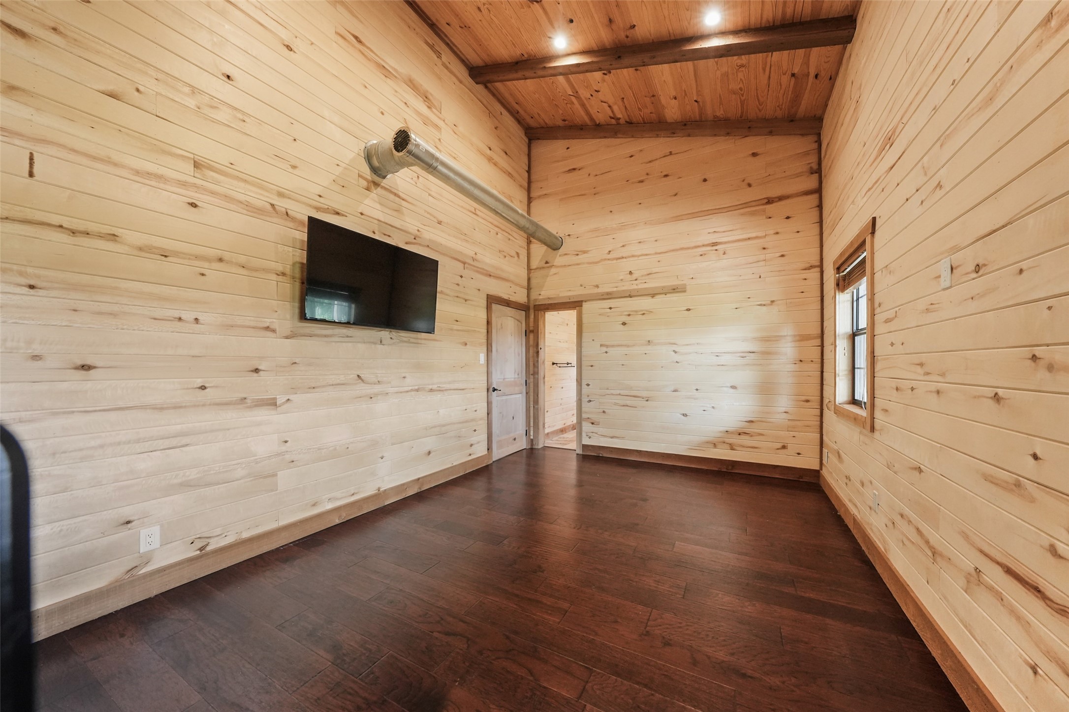 26534 Mitchell Road Hempstead, TX 77445 - Photo 26 of 45 a view of a livingroom with wooden floor and a window