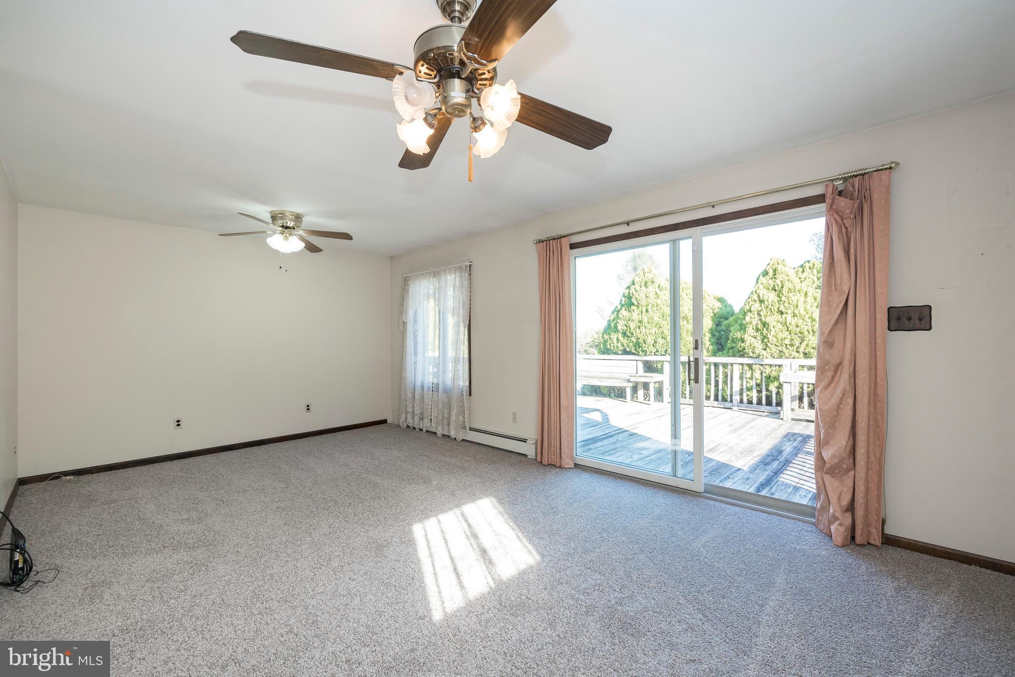 312 North Sandy Hill Road Coatesville, PA 19320 - Photo 18 of 55 Master Bedroom with Slider to Deck