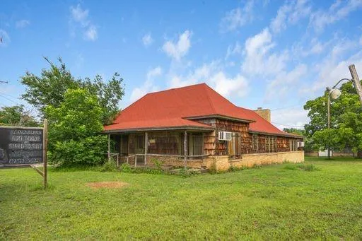 a view of backyard with green space