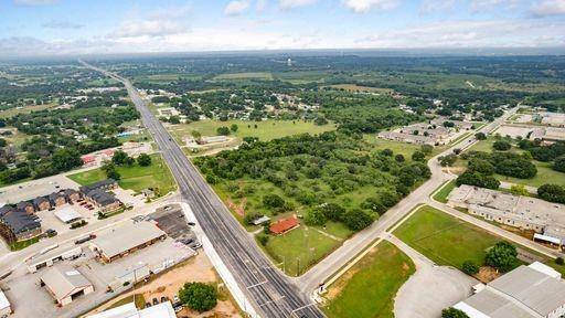 1101 Early Boulevard Early, TX 76802 - Photo 2 of 34 an aerial view of residential houses with outdoor space