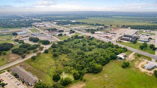 1101 Early Boulevard Early, TX 76802 - Photo 23 of 34 an aerial view of residential building with outdoor space