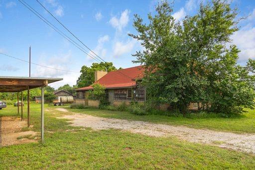 1101 Early Boulevard Early, TX 76802 - Photo 32 of 34 a view of a house with a yard
