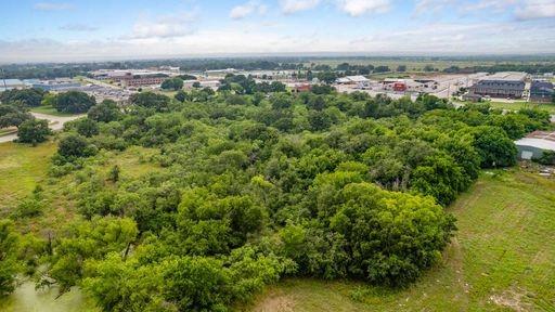1101 Early Boulevard Early, TX 76802 - Photo 5 of 34 an aerial view of a city with lots of residential buildings ocean and mountain view in back