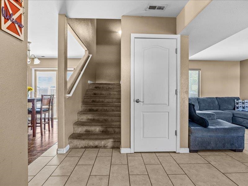 2860 B B 3/4 Road Grand Junction, CO 81503 - Photo 17 of 29 a view of a livingroom with furniture and stairs