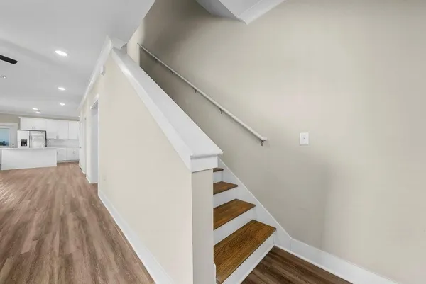 a view of entryway with wooden floor