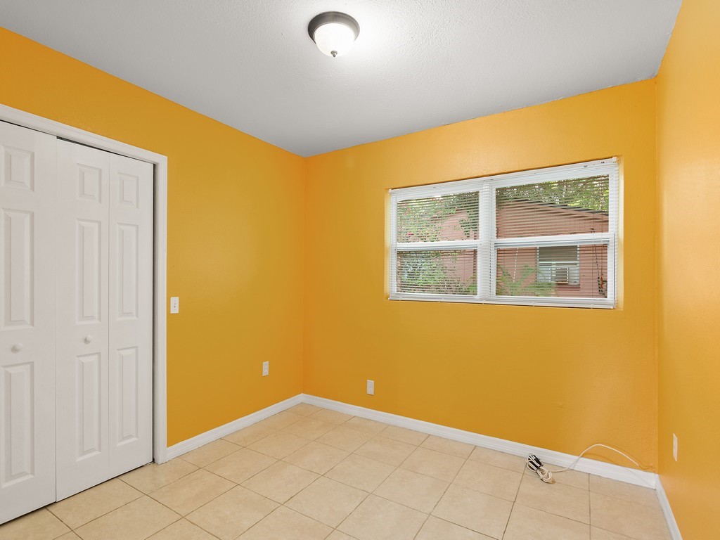 4341 35th Avenue Vero Beach, FL 32967 - Photo 13 of 25 a view of an empty room with window