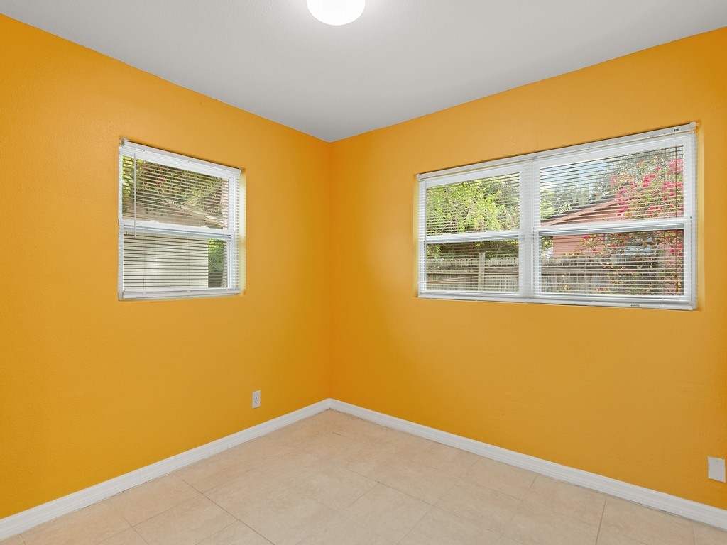 4341 35th Avenue Vero Beach, FL 32967 - Photo 14 of 25 a view of a blue wall with windows