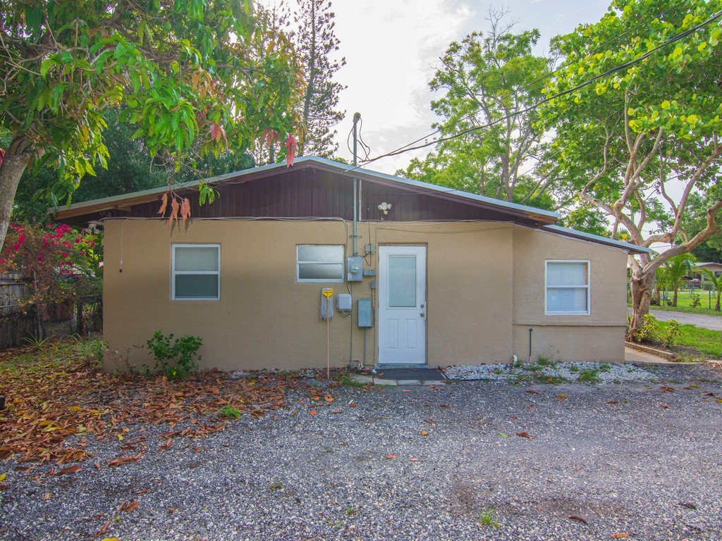 4341 35th Avenue Vero Beach, FL 32967 - Photo 22 of 25 a view of a house with a yard