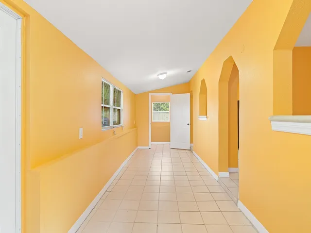 a view of a room with windows