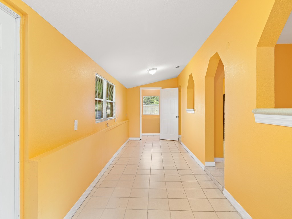 4341 35th Avenue Vero Beach, FL 32967 - Photo 6 of 25 a view of a room with windows