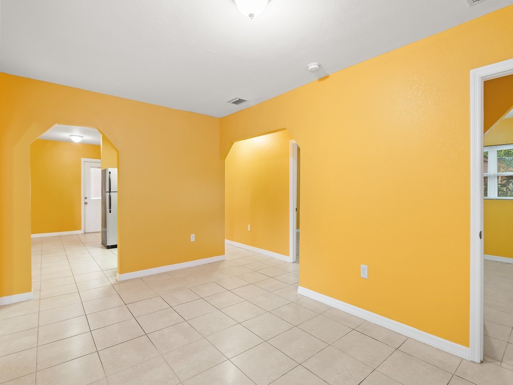 4341 35th Avenue Vero Beach, FL 32967 - Photo 7 of 25 a view of a big room with windows