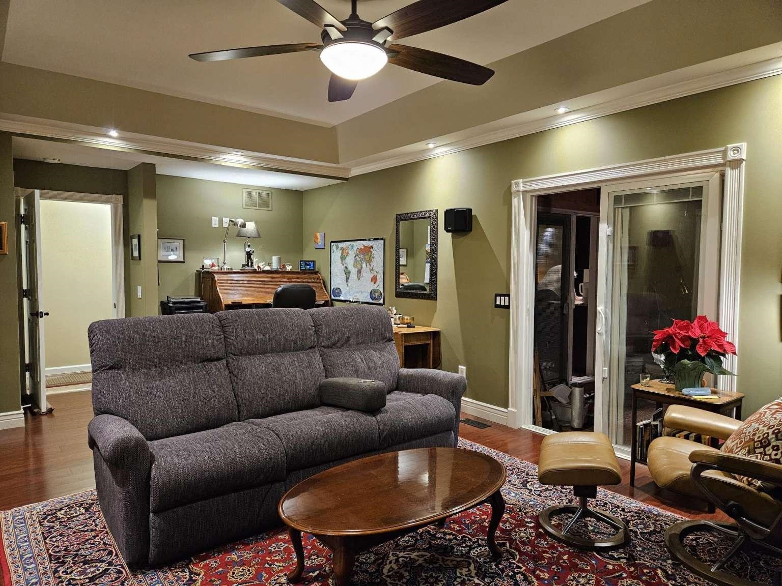1200 Tyler Road Woodbine, NJ 08270 - Photo 19 of 29 a living room with furniture and a chandelier