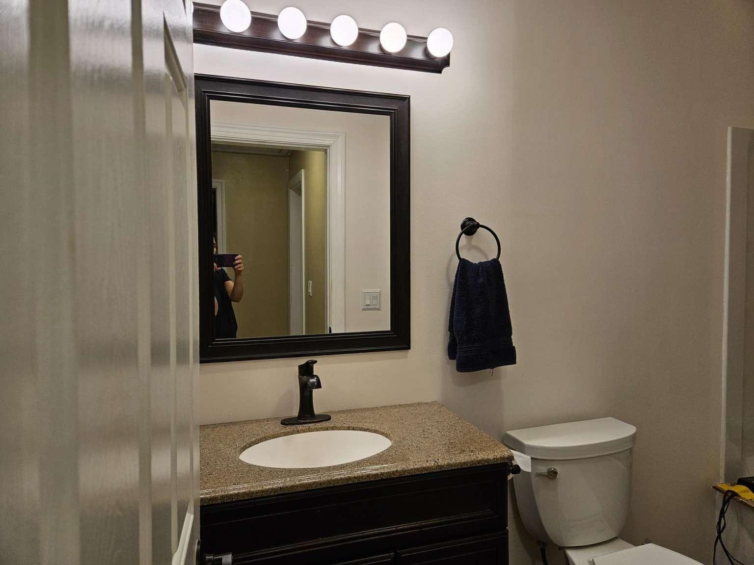 1200 Tyler Road Woodbine, NJ 08270 - Photo 28 of 29 a bathroom with a toilet sink and mirror