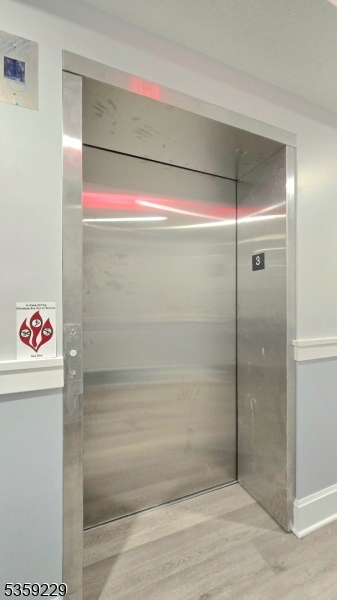 135 Fairfield Road, Unit 205 Fairfield, NJ 07004 - Photo 13 of 18 a bathroom with a shower and a sink