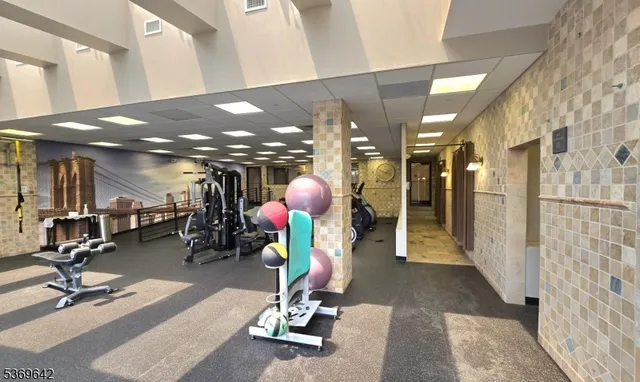 a gym room with gym equipment