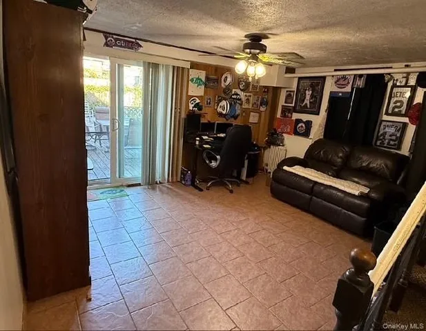 a view of a livingroom with furniture and window
