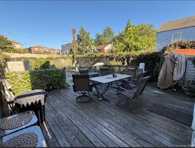 a view of a chairs and table on the wooden floor