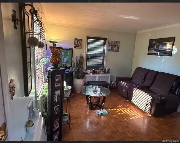 a living room with furniture fireplace and a flat screen tv