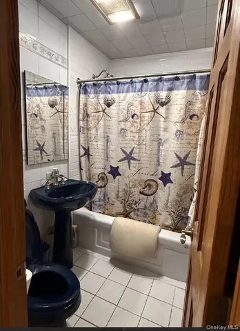 a living room with a couch and a table