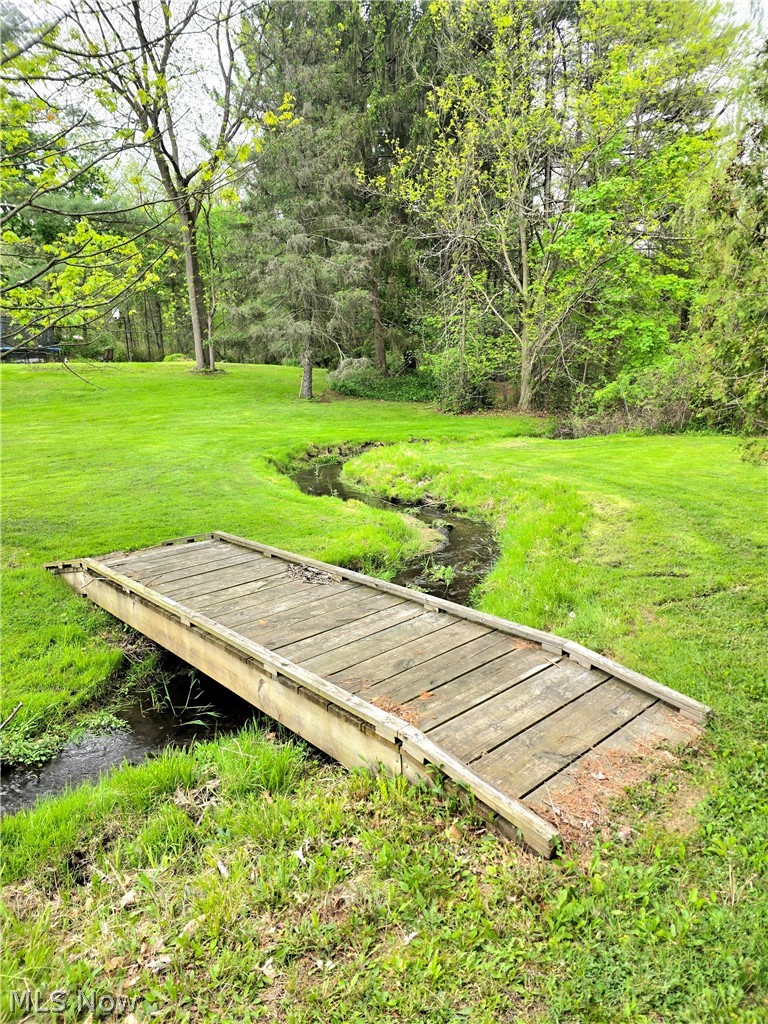 2462 Myersville Road Uniontown, OH 44685 - Photo 36 of 43 small creek with bridge