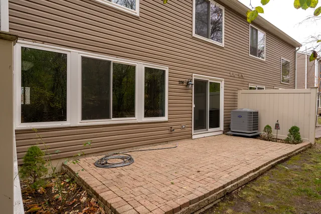 a view of a house with backyard