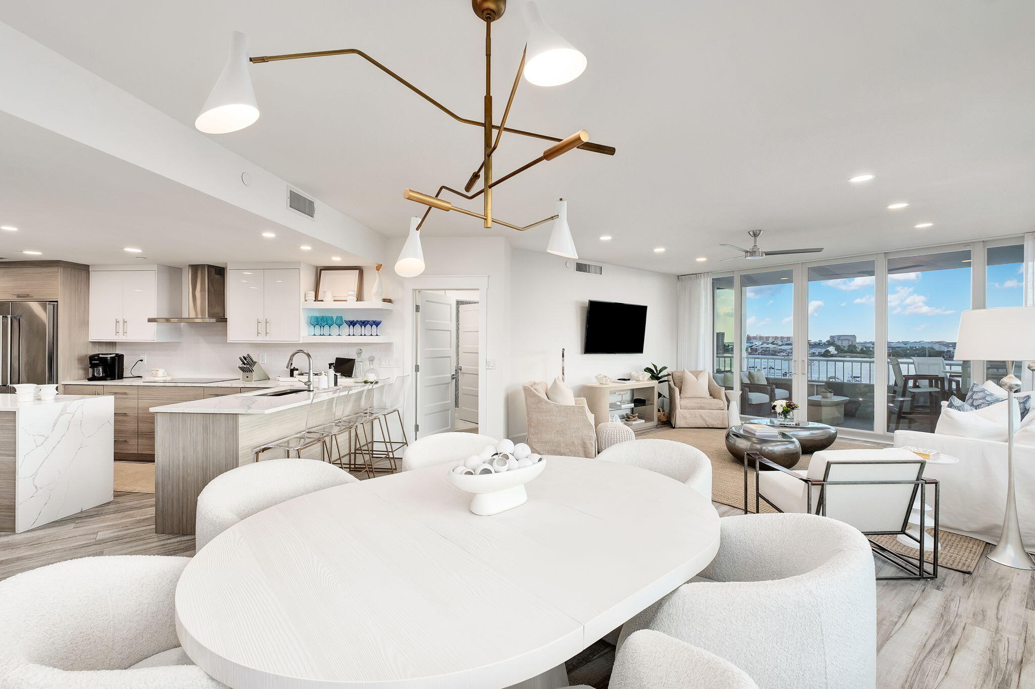 320 Harbor Boulevard, Unit A305 Destin, FL 32541 - Photo 18 of 71 a living room with stainless steel appliances kitchen island granite countertop furniture and a kitchen view