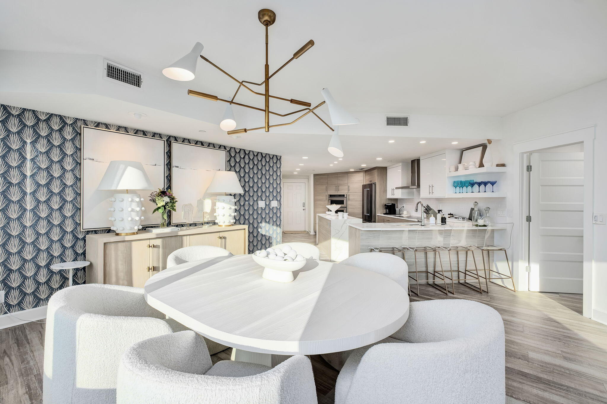 320 Harbor Boulevard, Unit A305 Destin, FL 32541 - Photo 19 of 71 a living room with stainless steel appliances furniture a dining table and a chandelier