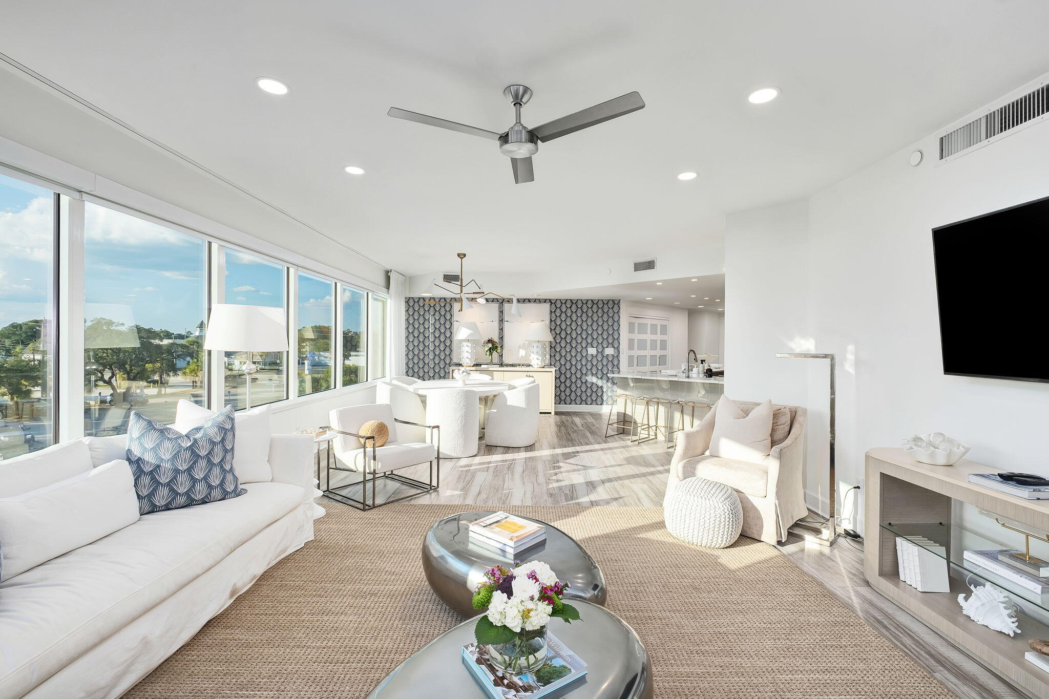 320 Harbor Boulevard, Unit A305 Destin, FL 32541 - Photo 25 of 71 a living room with fireplace furniture and a flat screen tv