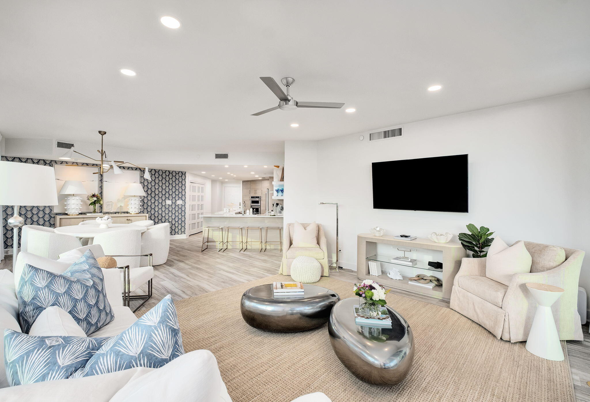 320 Harbor Boulevard, Unit A305 Destin, FL 32541 - Photo 26 of 71 a living room with furniture and a flat screen tv