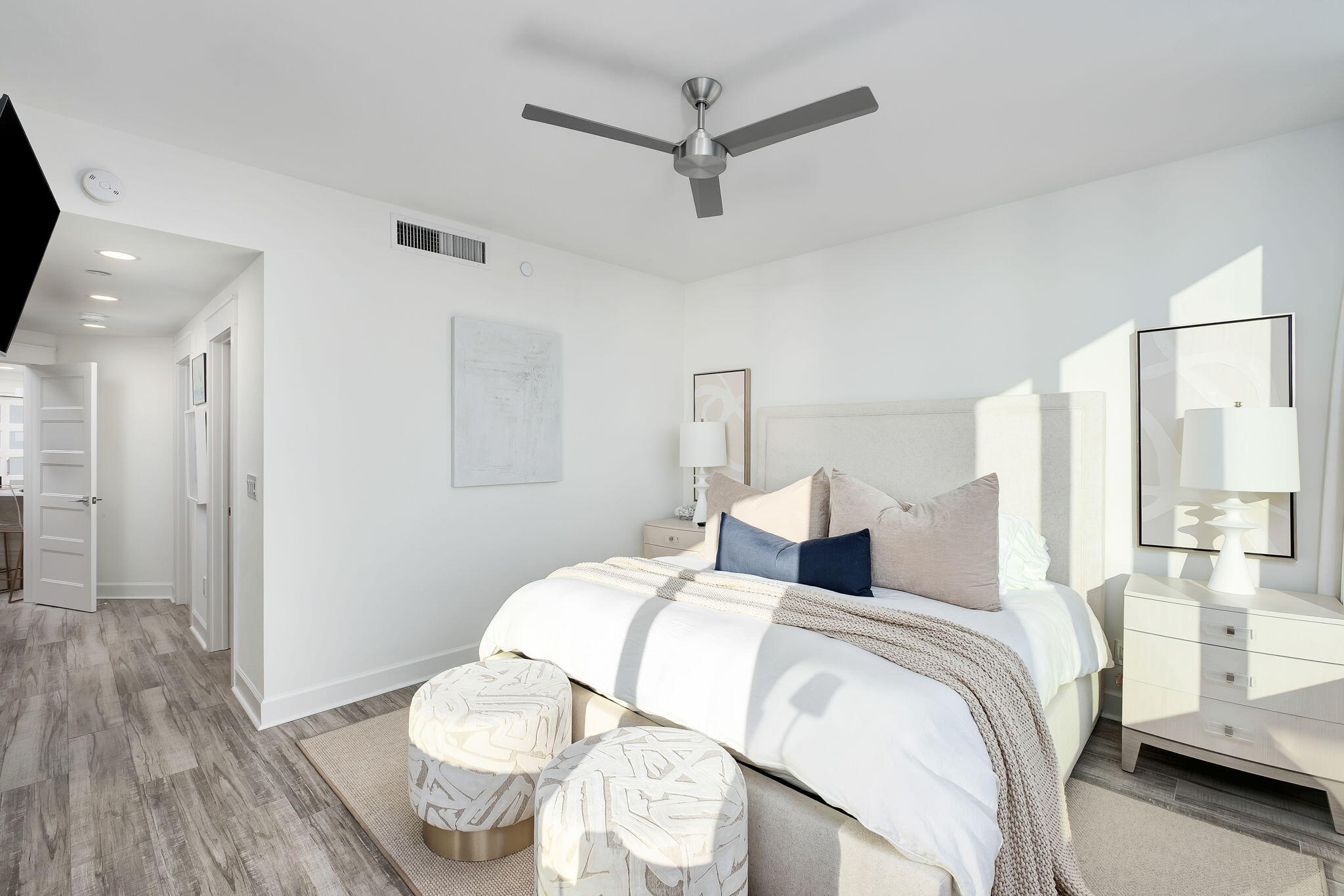 320 Harbor Boulevard, Unit A305 Destin, FL 32541 - Photo 29 of 71 a bedroom with a bed and a table