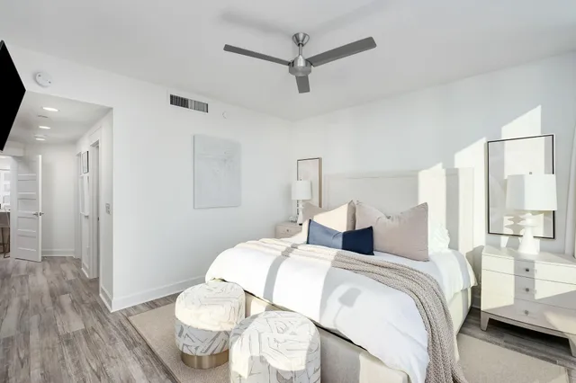 a bathroom with a sink a mirror and a shower