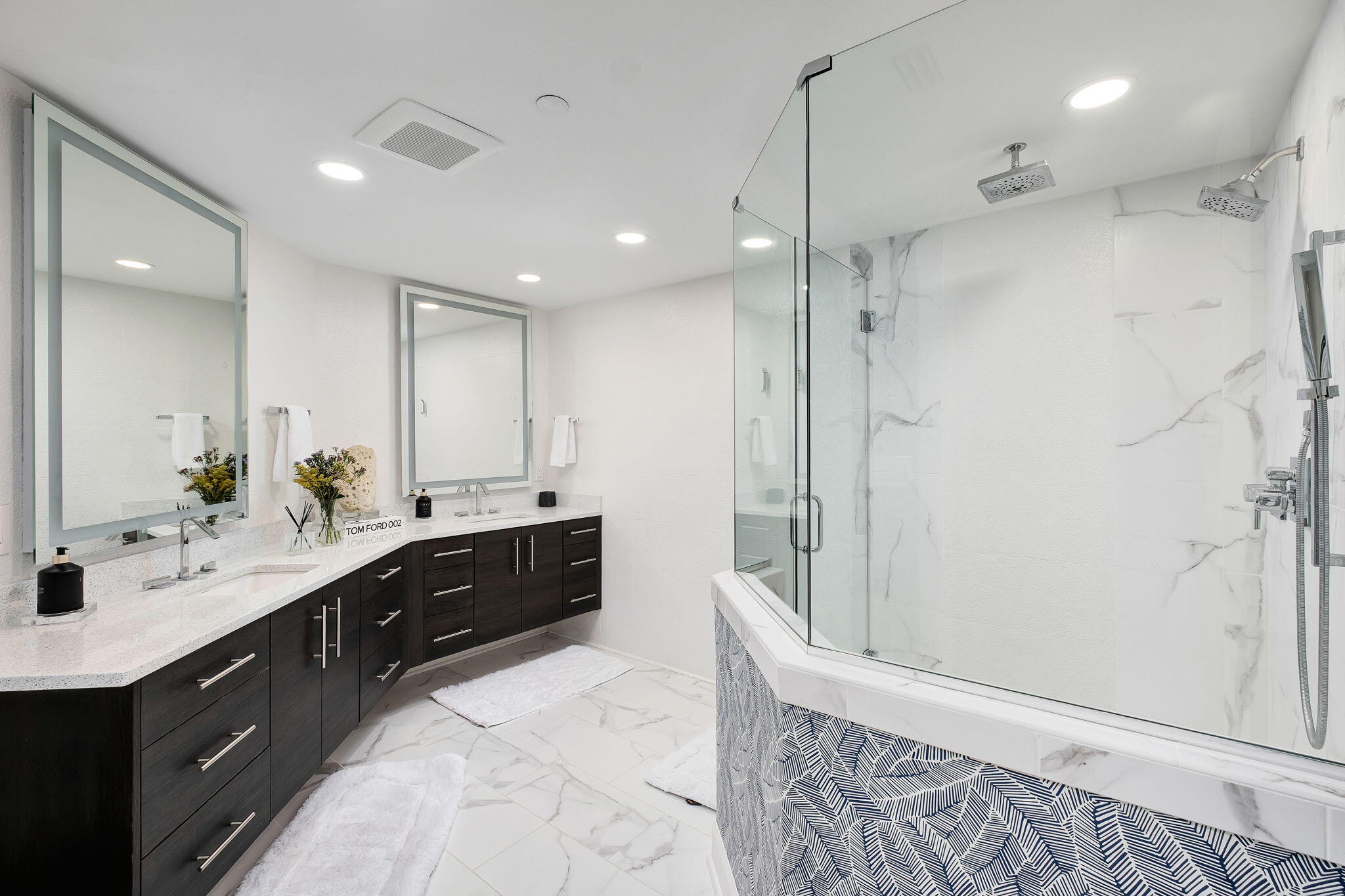 320 Harbor Boulevard, Unit A305 Destin, FL 32541 - Photo 30 of 71 a large bathroom with a double vanity sink a large mirror and shower