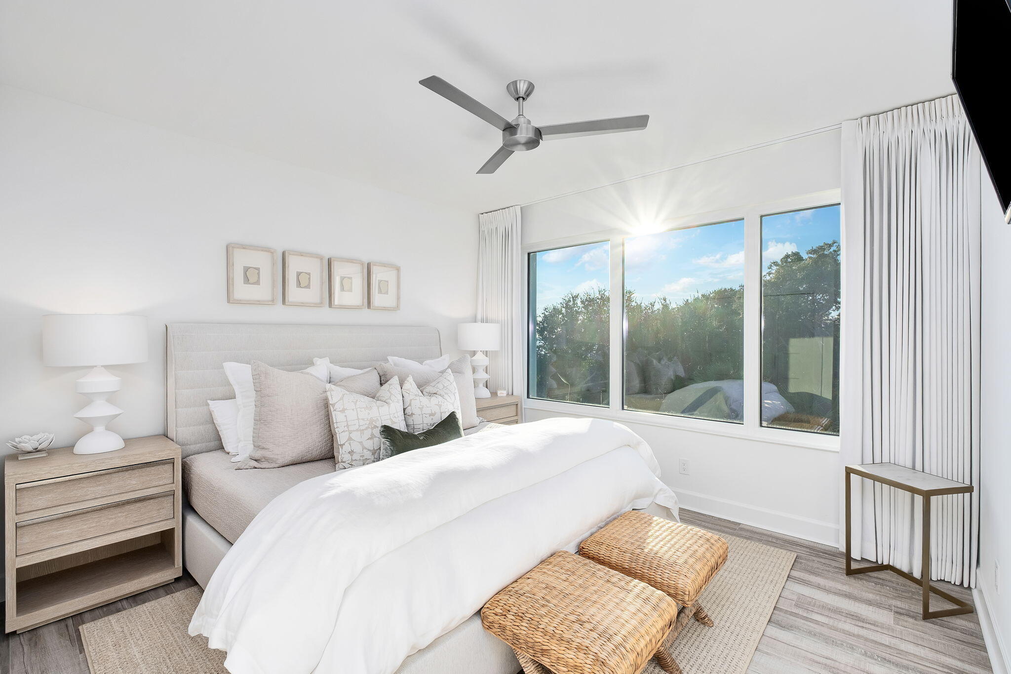 320 Harbor Boulevard, Unit A305 Destin, FL 32541 - Photo 33 of 71 a bedroom with a large bed and a large window